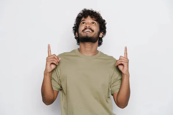 Young Bearded Man Smiling Pointing Fingers Upward Isolated White Background — Stockfoto