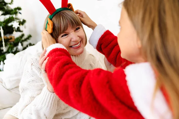 White Family Making Fun Christmas Reindeer Antlers Headband Home — Foto Stock