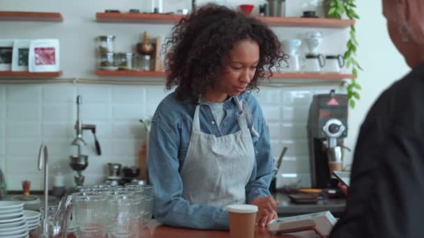 Smiling Woman Barista Talking Customer Cafe — Vídeo de Stock