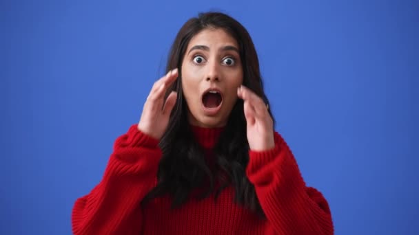 Surprised Indian Brunette Woman Looking Camera Isolated Blue Background — Video