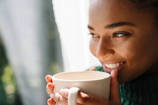 Young Black Woman Pigtails Smiling While Drinking Tea Home — 스톡 사진