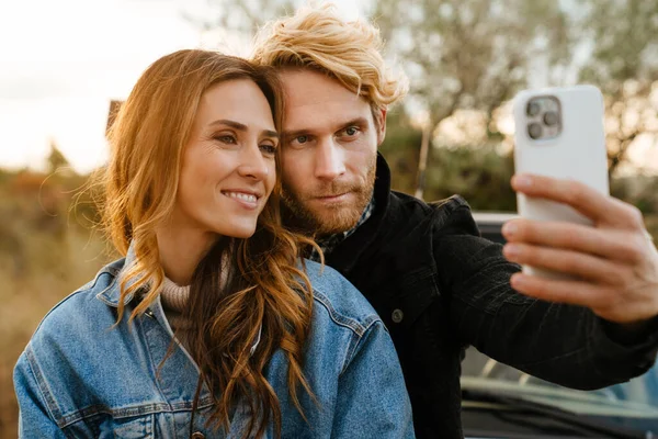 White Mid Couple Taking Selfie Cellphone While Standing Car Trip — Stockfoto