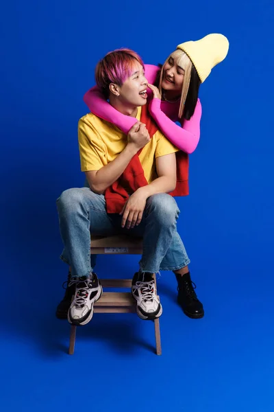 Asian Couple Multicolored Hair Making Fun Together Isolated Blue Wall — Fotografia de Stock