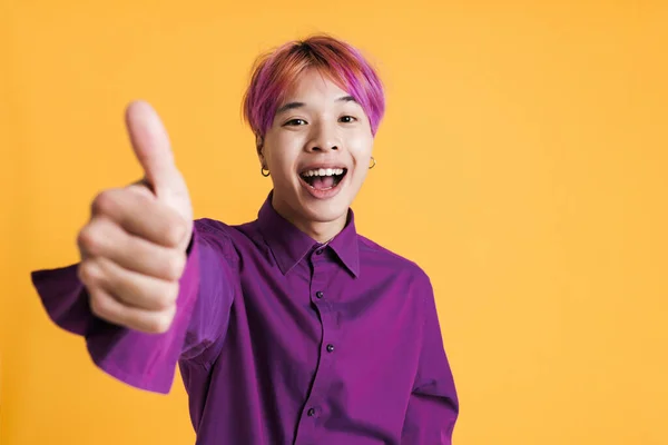 Asian Boy Pink Hair Laughing While Showing Thumb Isolated Yellow — Stock fotografie