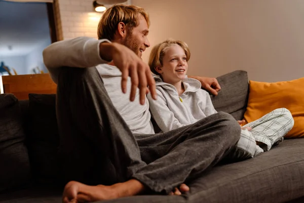 Ginger Son Father Laughing While Sitting Sofa Together Home — Stockfoto