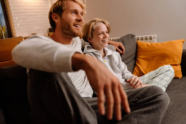 Ginger Son Father Laughing While Sitting Sofa Together Home — Stockfoto