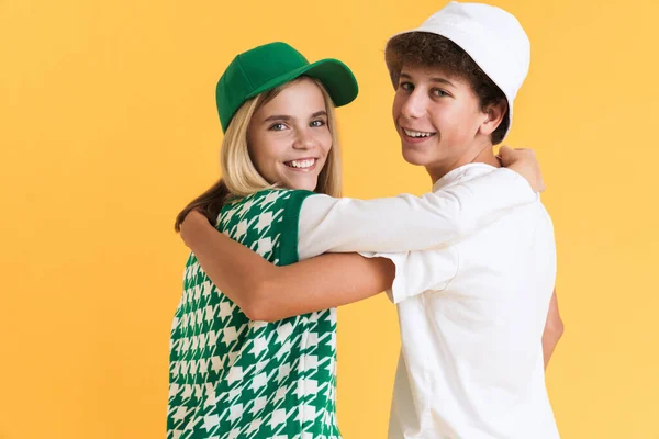 White Girl Boy Laughing While Hugging Together Isolated Yellow Background — Stock Photo, Image