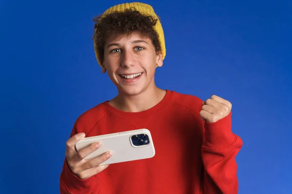 White Boy Gesturing While Playing Online Game Mobile Phone Isolated — Stock Photo, Image