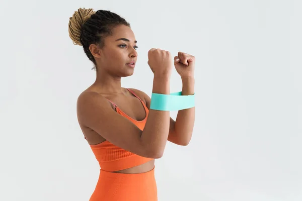 Black Young Sportswoman Working Out Expander Stretch Tape Isolated White — Stockfoto