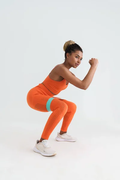 Black Young Sportswoman Working Out Expander Stretch Tape Isolated White — Foto de Stock