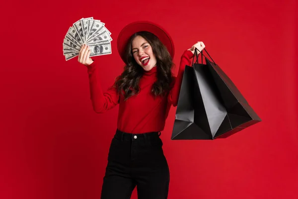 White Woman Laughing While Posing Shopping Bags Dollars Isolated Red — Φωτογραφία Αρχείου