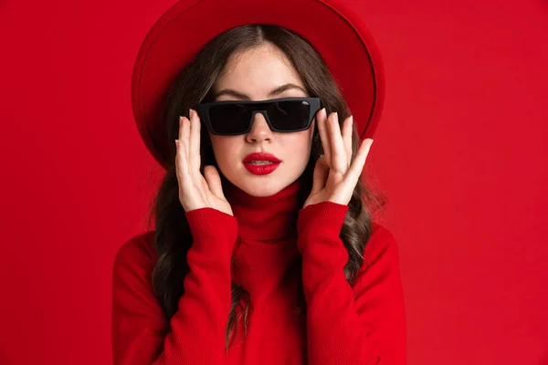 White Woman Wearing Eyeglasses Posing Looking Camera Isolated Red Background — стоковое фото