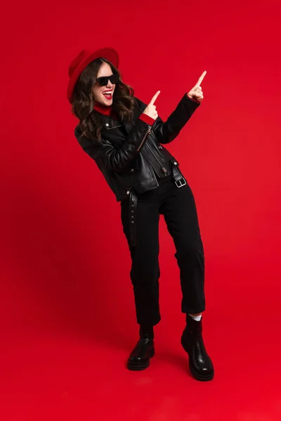 White Woman Leather Jacket Laughing Pointing Fingers Aside Isolated Red — Foto de Stock