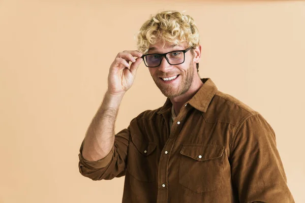 White Blonde Man Eyeglasses Looking Smiling Camera Isolated Beige Background — стоковое фото