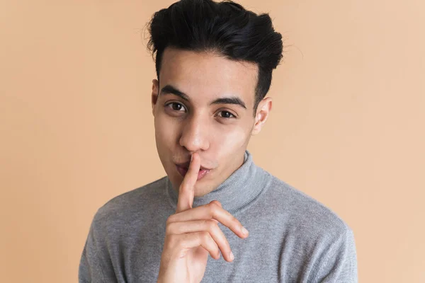 Young Middle Eastern Man Showing Silence Gesture Camera Isolated Beige — Stockfoto