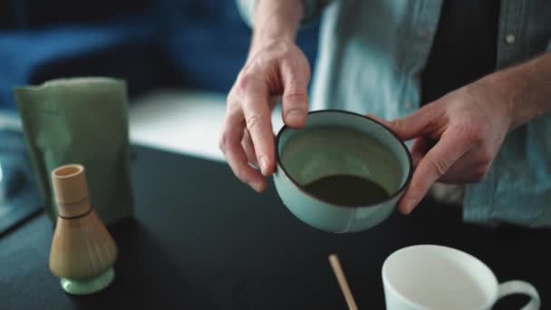 Male Hands Pouring Matcha Cup Home — Stock Video