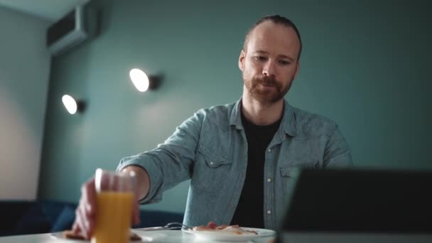 Confident Blond Man Eating Breakfast Looking Tablet Morning Home — Stok Video