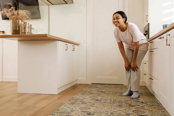 Young Hispanic Woman Smiling While Standing Kitchen Home — 图库照片