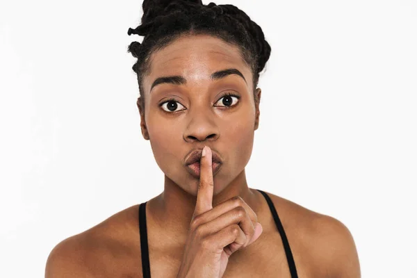Black Young Woman Looking Camera While Showing Silence Gesture Isolated — 스톡 사진