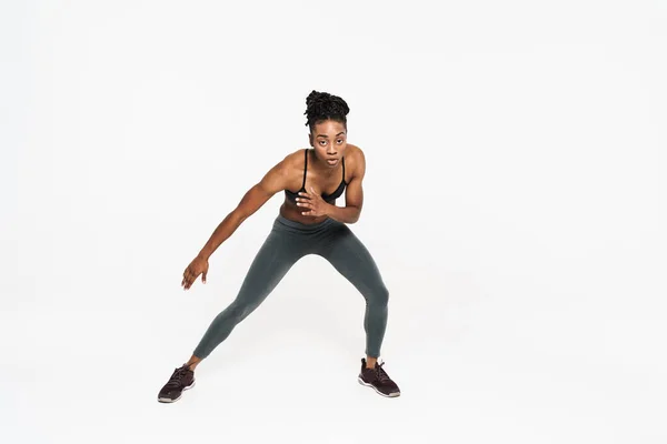 Young Black Sportswoman Doing Exercise While Working Out Isolated White — ストック写真