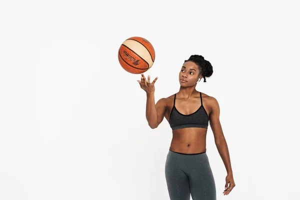 Black Young Sportswoman Earphones Working Out Basketball Isolated White Background — Stok Foto