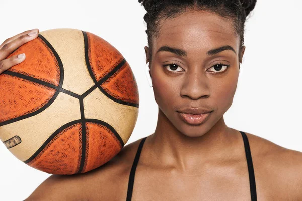 Black Young Sportswoman Earphones Posing Basketball Isolated White Background — стоковое фото