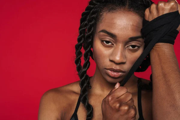 Young Black Sportswoman Wearing Bra Posing Rope Isolated Red Background — Φωτογραφία Αρχείου