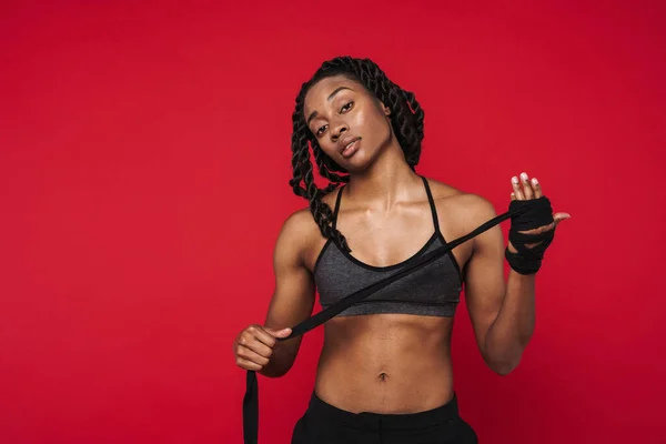 Young Black Sportswoman Wearing Bra Posing Rope Isolated Red Background — Stock Photo, Image