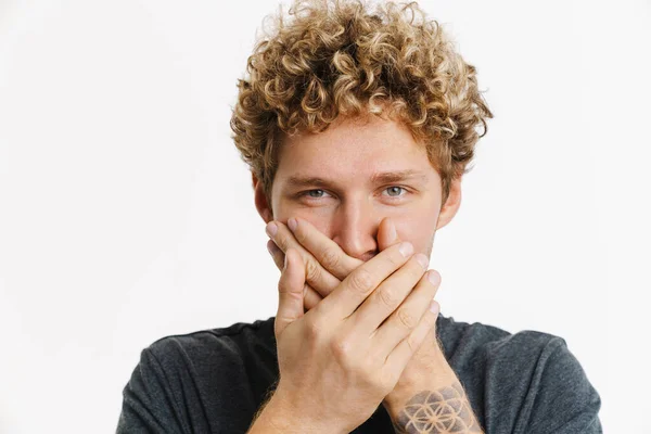 Young Blonde Man Curly Hair Covering His Mouth Isolated White — стоковое фото
