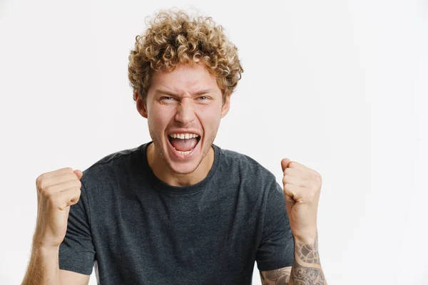 Young Blonde Man Screaming While Making Winner Gesture Isolated White — Photo