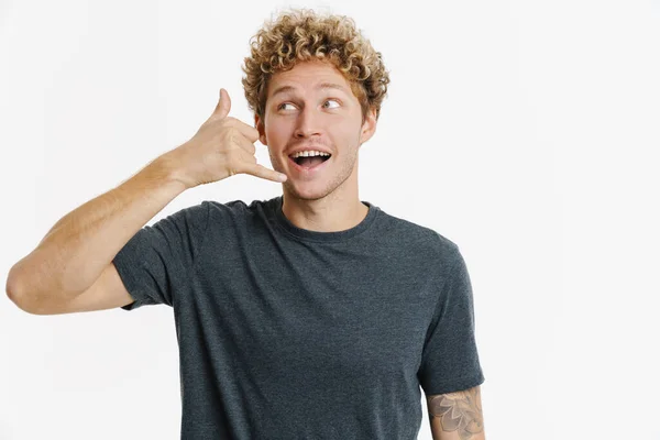 Young Blonde Man Curly Hair Smiling Making Call Gesture Isolated — Stockfoto