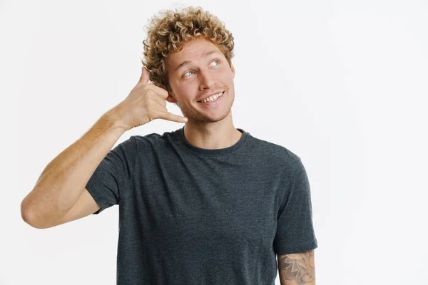 Young Blonde Man Curly Hair Smiling Making Call Gesture Isolated — стоковое фото