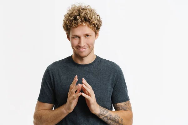 Young Blonde Man Curly Hair Smiling Holding Hands Together Isolated — 图库照片