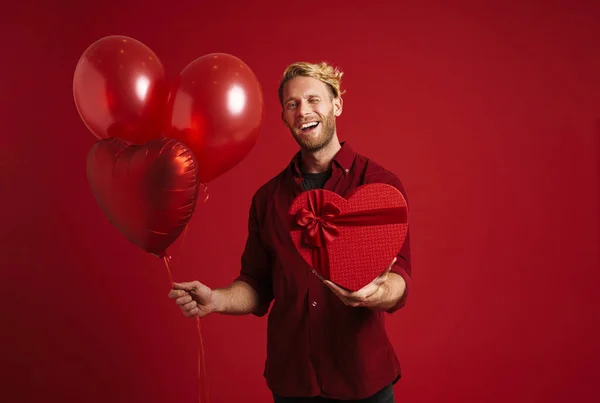 White Man Winking While Posing Balloons Heart Gift Box Isolated — Stok fotoğraf