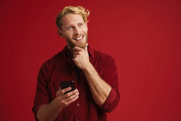 White Bearded Man Wearing Shirt Smiling Using Cellphone Isolated Red — Foto de Stock