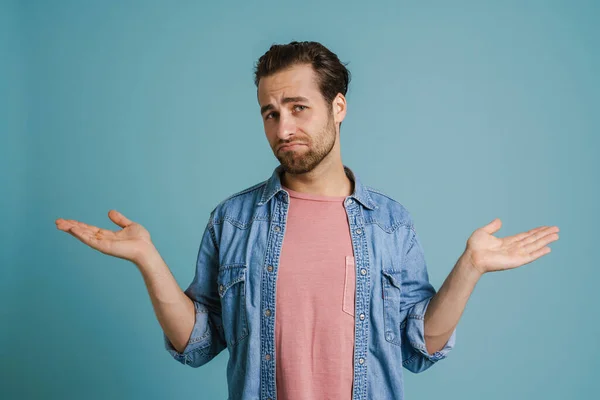 Young Man Wearing Shirt Gesturing Frowning Camera Isolated Blue Background — Stock fotografie