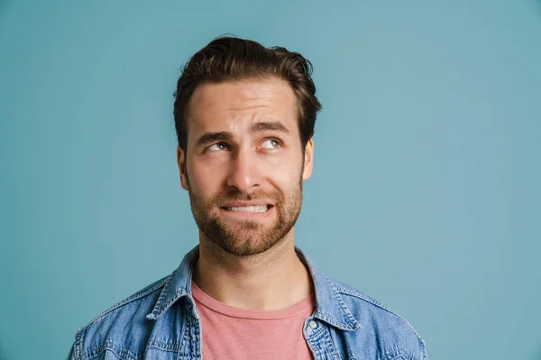 Young Bristle Man Wearing Shirt Frowning Looking Aside Isolated Blue — Foto de Stock