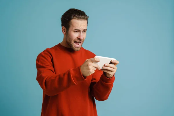 Young Excited Man Screaming While Playing Online Game Cellphone Isolated — Foto de Stock