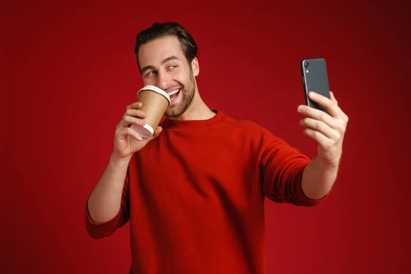 Young Bristle Man Drinking Coffee While Taking Selfie Cellphone Isolated — Fotografia de Stock