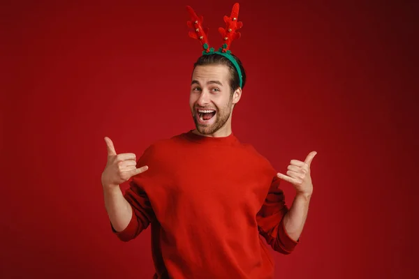 Young Man Wearing Christmas Antler Laughing Gesturing Isolated Red Background — Photo