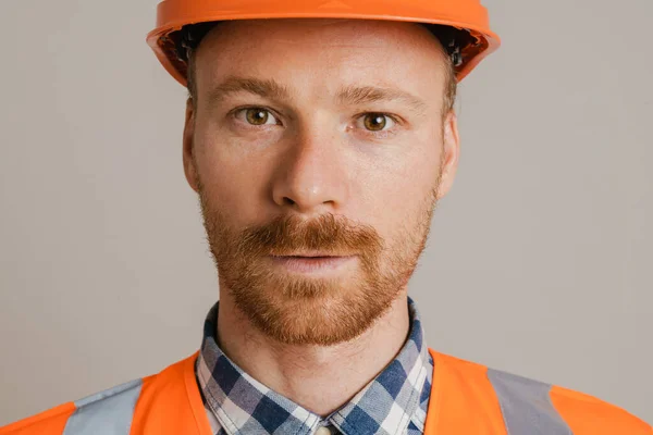 White Man Worker Wearing Helmet Vest Looking Camera Isolated Grey — Fotografia de Stock
