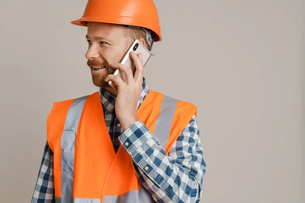 White Man Worker Wearing Helmet Talking Mobile Phone Isolated Grey — Stock Fotó