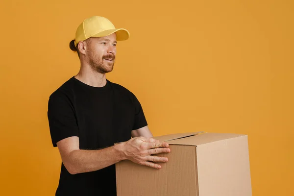 White Delivery Man Cap Smiling While Posing Cardboard Box Isolated — Stock Photo, Image