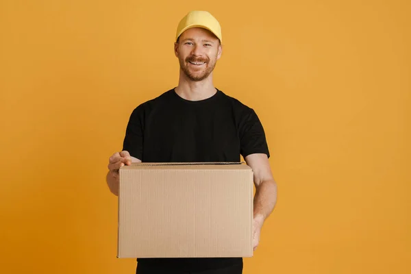 White Delivery Man Cap Smiling While Posing Cardboard Box Isolated — Stock Photo, Image