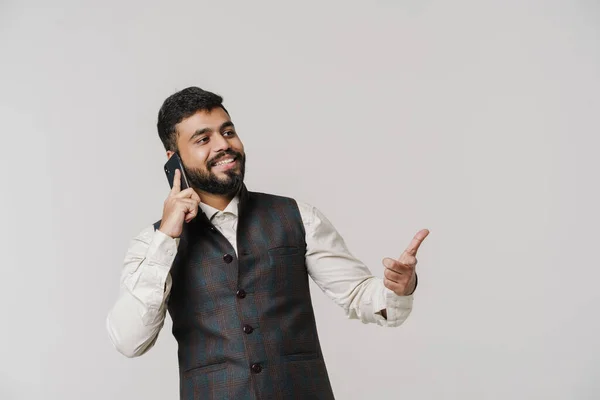 Bearded South Asian Man Gesturing While Talking Cellphone Isolated White — 스톡 사진