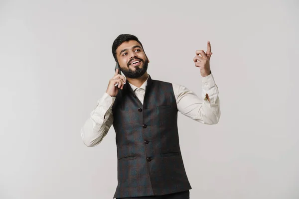 Bearded South Asian Man Gesturing While Talking Cellphone Isolated White — 스톡 사진