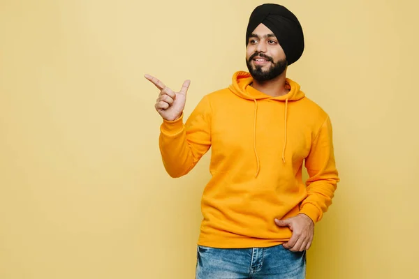 Bearded South Asian Man Smiling Pointing Finger Aside Isolated Yellow — 스톡 사진