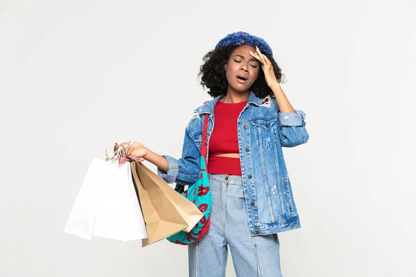 Young Black Woman Headache Posing Shopping Bags Isolated White Background — Stockfoto