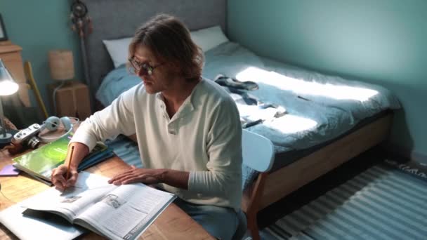 Handsome Blond Man Eyeglasses Doing English Homework Home Indoors — Video Stock