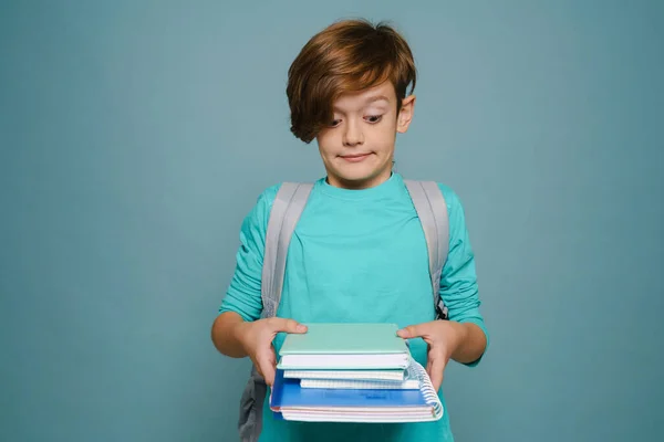 Ginger Perplexed Boy Backpack Posing Exercise Books Isolated Blue Wall — Fotografia de Stock